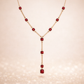 Zilveren Y‑ketting met rubi rode crystal steentjes