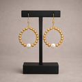 Gouden ronde oorbellen met glasparels